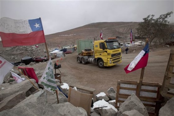 A truck carrying pieces of the third drill that will be used in the rescue of 33 trapped miners, arrive at the San Jose mine in Copiapo, Chile, on Sunday.